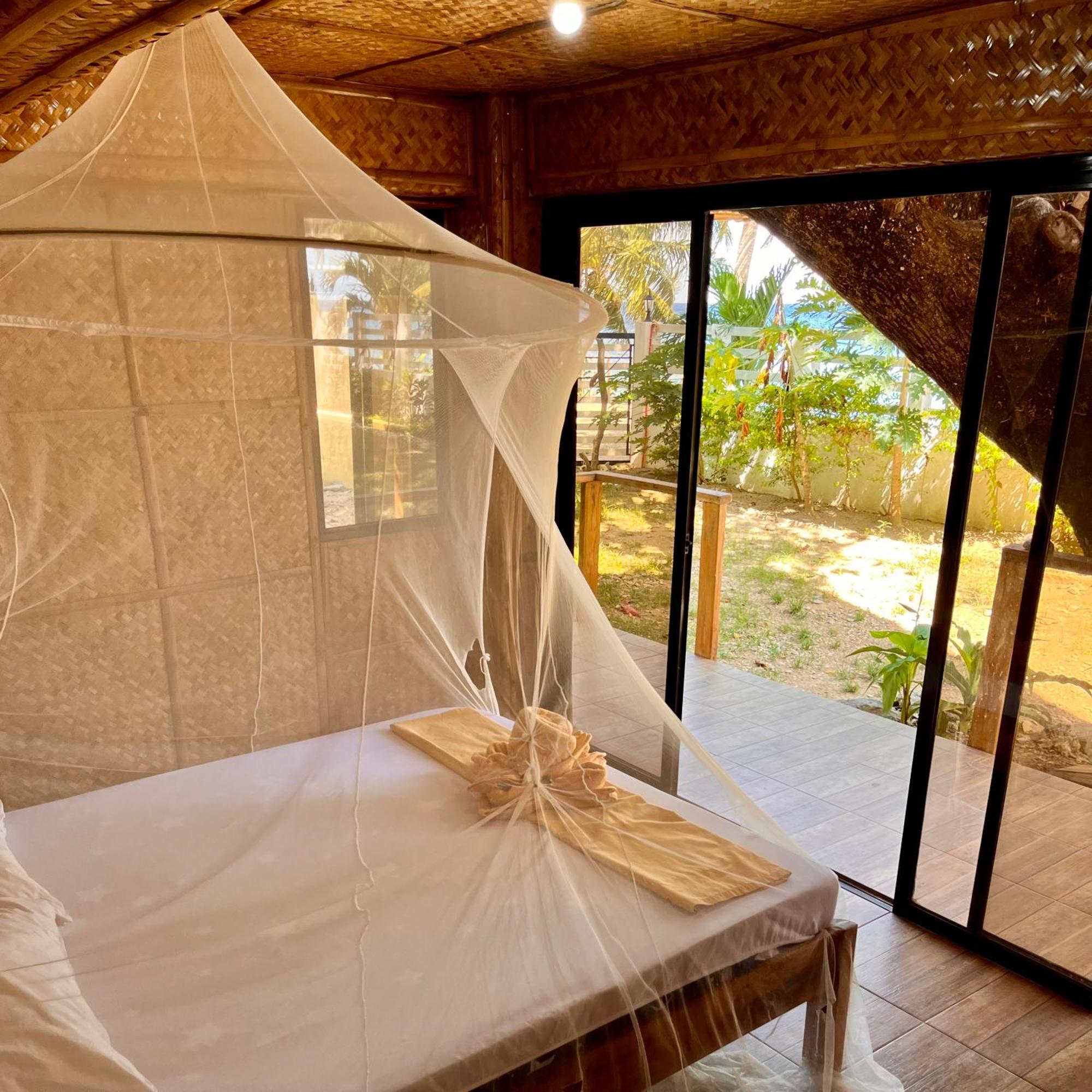 Amami Beachfront Villa With Private Beach Puerto Galera Exterior photo